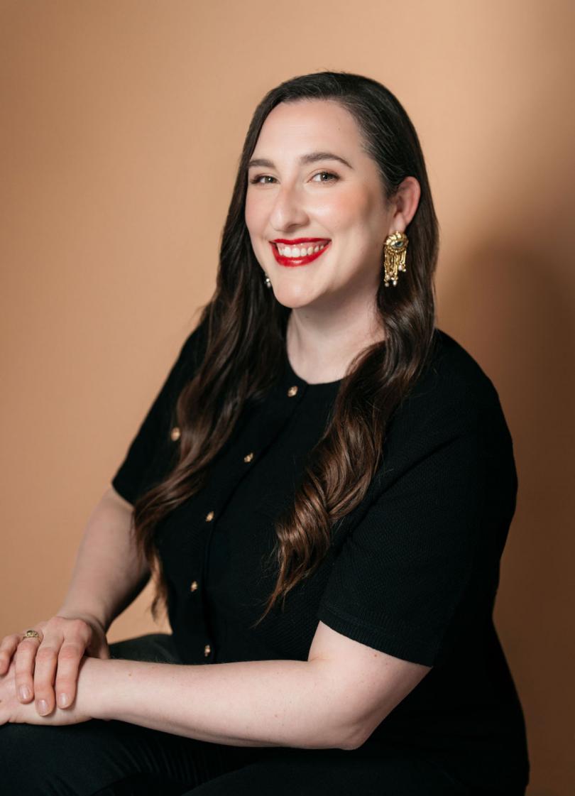 Emily smiling at the camera